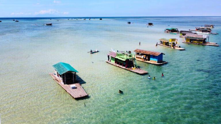 Floating cottage on the water, offering a serene and peaceful escape.